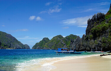 Wall Mural - traditional wooden outrigger boats on palawan island