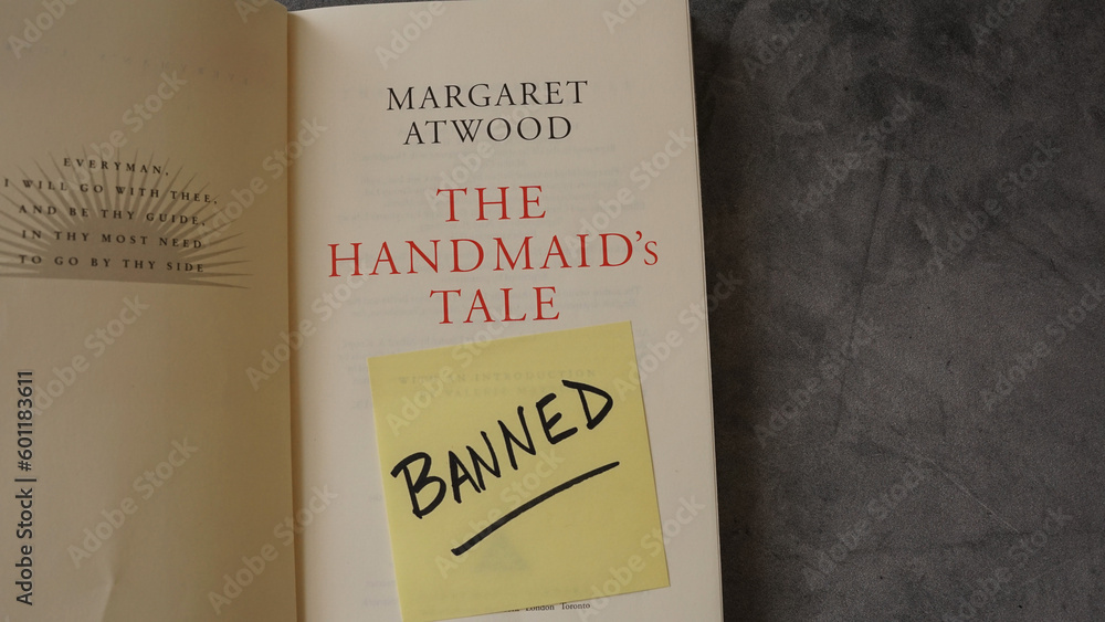 Title page inside a copy of The Handmaid's Tale by Margaret Atwood with a note saying "banned." The book has landed on many school and library banned book lists.