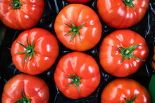 Group Of Ripe Red Tomatoes In Grocery Produce 