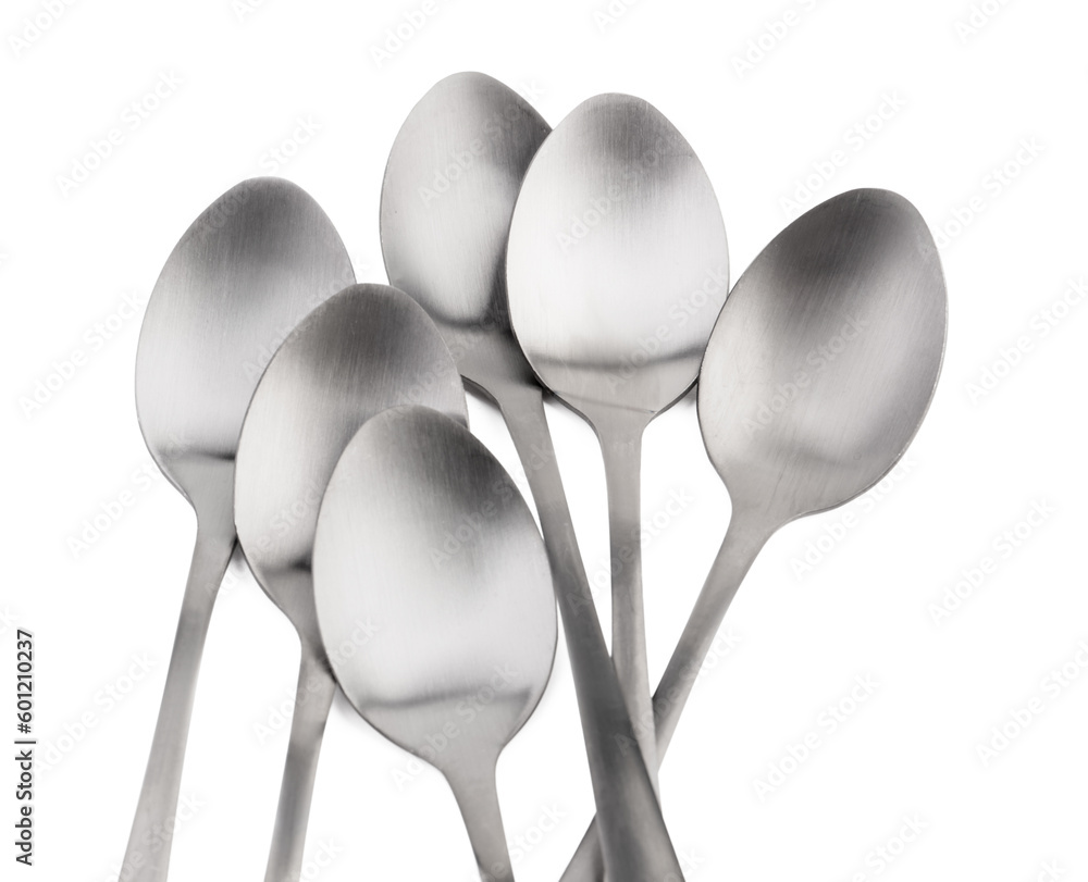 Stainless steel spoons on white background