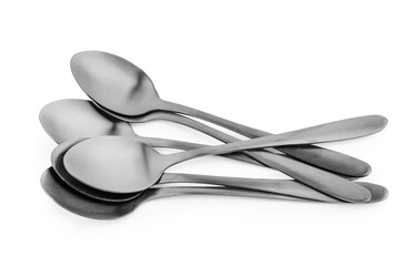 Stainless steel spoons on white background