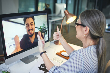 Online meeting, thumbs up and business team in agreement on video call or webinar of a startup company. Yes, thank you and colleagues or woman talking to employee on internet conference or interview