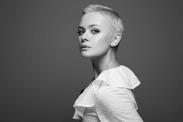 Wall Mural - black and white portrait of short hair beautiful young woman