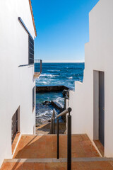 Calella de Palafrugell, Catalunya, Spain - January 7, 2022: Sea facing Mediterranean houses