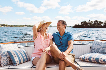 laughing, happy couple and on a boat for retirement travel, summer freedom and holiday in bali. smil