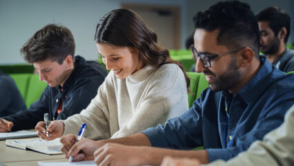 Leinwandbilder - Smart Young Students Studying in University with Diverse Multiethnic Classmates. Scholars Have a Conversation in College Room. Applying Knowledge and Talking to Each Other in Class