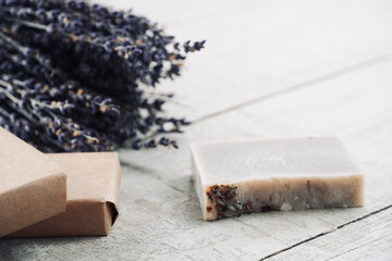 Handmade lavender soaps. Ecological soap bars. Natural soap bars on rustic white background with space for text. 