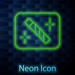 Sticker - Glowing neon line Photo retouching icon isolated on brick wall background. Photographer, photography, retouch icon. Vector