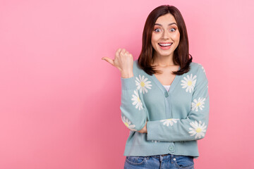Wall Mural - photo of funky impressed woman dressed teal outfit pointing thumb empty space isolated pink color ba