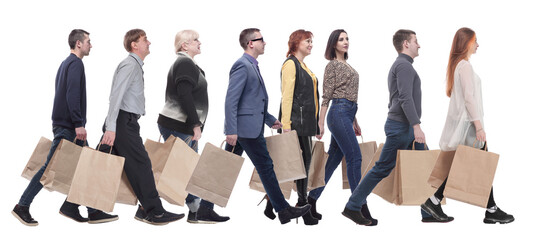 Wall Mural - a group of people are running paper shopping bags