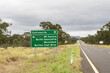 Directional road sign for Burton Downs Coal Mine, Moranbah and North Goonyella mine in the Bowen Basin in Central Queensland, Australia