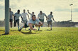 Sports, men rugby team on green field and playing with a ball. Teammates with fitness or activity outdoors, collaboration or teamwork and happy or excited people celebrate a player score a try