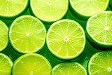 Fototapeta Panele - Refreshing Lime Slice on Bright Green Background for Summer Themed Designs. created with Generative AI