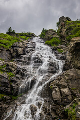 Canvas Print - Capra Waterfall next to Transfagarasan Road in Carpathian Mountains in Romania