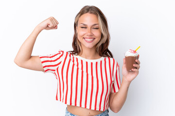 Young Russian girl holding cappuccino isolated on white background doing strong gesture