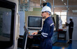 © APchanel - Engineer technician under control digital factory production technology by Labtop showing automation manufacturing machine process of the new industrial revolution and IOT software to control concept.