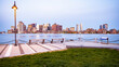 The architecture of Boston in Massachusetts, USA showcasing the skyline of the city as seen from East Boston across the channel at sunrise.