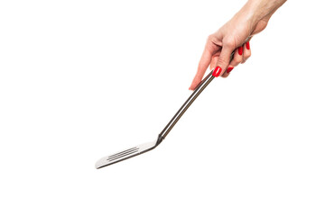 Female hand hold spatula. Isolated on a white background