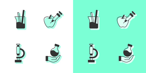 Wall Mural - Set Test tube, Laboratory glassware, Microscope and Genetically modified apple icon. Vector