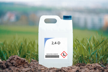 2,4-D  selective herbicide used on broadleaf weeds.