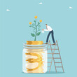 Income increase and management of own money resources, profit from investments or innovations or bank deposits, salary increases, savings and accumulation of money, businessman waters a jar of coins.