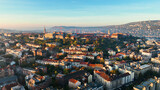 Fototapeta Miasto - Morning light, Establishing Aerial View Shot of Budapest, Hungary. Buda and Danube river at sunrise