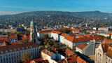 Fototapeta Miasto - Aerial view of Budapest city skyline. Church of Mary Magdalene of Buda, one of the oldest churches of the Varkerulet District, Buda Castle District