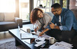 © Donson/peopleimages.com - Couple plan budget, finance and bills for home, notes to pay for loan and mortgage debt in living room. Budgeting, man and woman happy with financial review of spending, income and savings of house