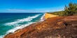 panorama of beautiful long beach with orange sand in deepwater national park south from agnes water and seventeen seventy; unique coast of gladstone region in queensland, australia;