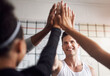 © Donson/peopleimages.com - Fitness, smile and high five of people in gym for motivation, support and target. Workout, exercise and training with hands of friends in sports center for team building, challenge and achievement