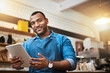 © Donson/peopleimages.com - Smile, tablet and portrait of man in cafe for online, entrepreneurship and startup. Retail, technology and food industry with small business owner in restaurant for barista, store and coffee shop