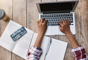 Woman, hands and laptop of student on mockup above for studying, education or research at cafe. Top view of female person hand working on computer for college or university project at coffee shop