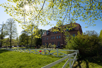 Canvas Print - Manor estate with paddock in May.