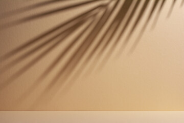 Abstract background of shadows palm leaves on a sand color wall