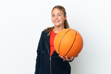 Wall Mural - Little caucasian girl isolated on white background playing basketball