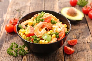 Sticker - bowl of mixed salad with shrimp, avocado, tomato and corn