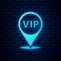 Poster - Glowing neon Location Vip icon isolated on brick wall background. Vector