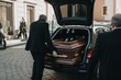 A man in a black suit and white gloves loads a coffin into a funeral car. Generative AI
