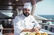 © lanych - Male chef working at a luxury yacht. Generative AI