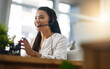 © Donson/peopleimages.com - Customer service, contact us or happy woman in call center consulting, speaking or talking at help desk. Virtual assistant, friendly agent or sales consultant in telemarketing or telecom company