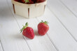 Strawberries on white wooden background
