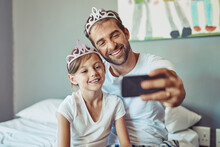 Man, Girl Child And Selfie In Princess Tiara, Happiness With Love And Care At Family Home. Smile In Picture, Father And Daughter Bonding With Crown, Happy People Spending Time Together In Bedroom