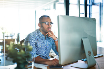 Fototapete - Business man, thinking and computer at desk in office for online research, reading email or report. Male entrepreneur person with internet connection for feedback, review and focus on project