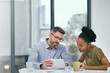 © Mapodile M/peopleimages.com - Connection, black woman and man with a tablet, planning and online reading with email, social media and brainstorming. Staff, employees and coworkers with technology, teamwork and share ideas online
