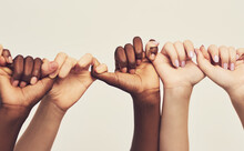 People, Holding Hands Or Thumb Together For Support, Diversity And Kindness On Studio Background. Team Or Group Of Friends Fingers For Unity, Promise And Solidarity Or Trust And Community Diversity