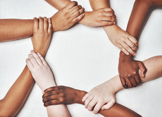 People, integration and hands together isolated on a white background in solidarity, support and diversity collaboration. Circle, strong and community power of women and men in synergy sign in studio