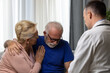 © Space_Cat - Distressed worried senior couple talking to doctor during bad medical result explanation