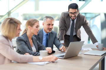 Poster - Group of business partners discussing ideas and planning work in office.