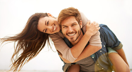 Canvas Print - Love, hug and portrait of couple piggyback at beach, hug and laughing while bonding outdoor. Face, embrace and happy man with woman at the ocean for travel, freedom or vacation, holiday or Miami trip