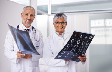 Canvas Print - Senior team of doctors in portrait with xray, people in radiology with healthcare and medical collaboration. Anatomy scan for surgery, old man and woman surgeon with smile, happy working together